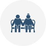 transitional-care-icon Icon showing senior couple on bench